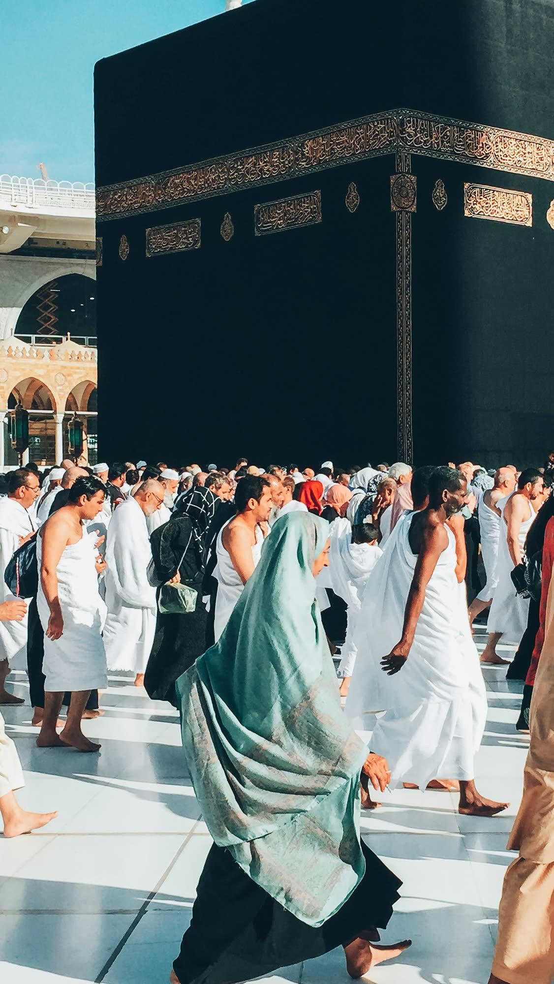 A pilgrim walking near the Kaaba